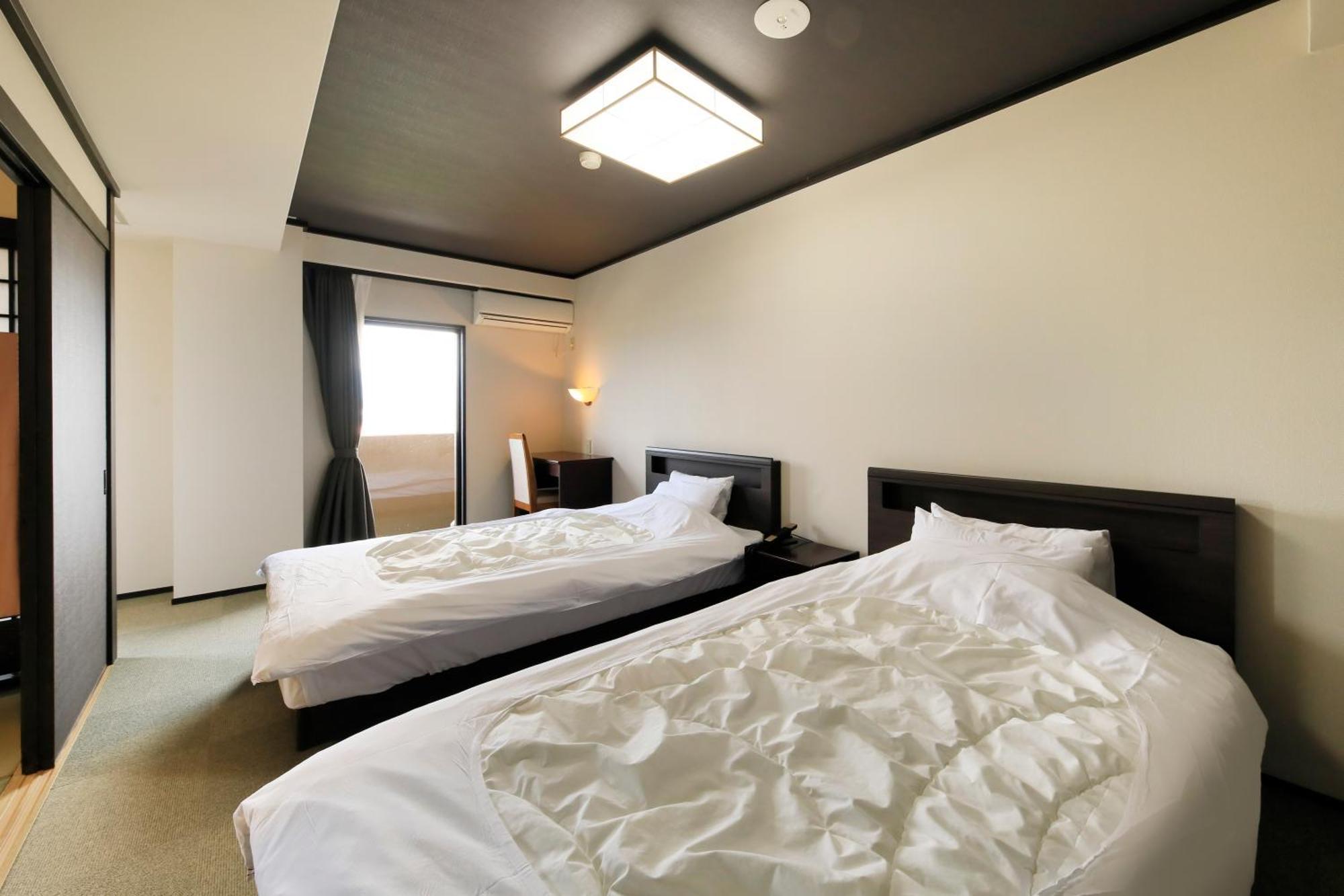 Yutorelo Yamaga Habitación foto
